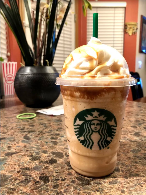 An Ultra Caramel Frappuccino, one of Starbucks most popular drinks, stands awaiting its first sip.