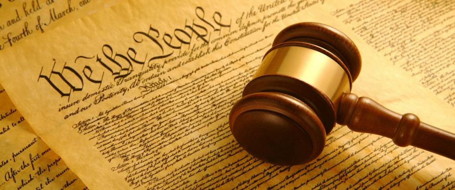 The+Constitution+lays+out+Articles+that+the+United+States+wants+to+abide+to%2C+with+Amendments+being+added+along+the+way.+Photo+and+credits+to+Getty+Images+-+United+States+Constitution+and+Gavel